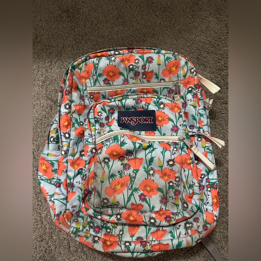JanSport book bag with orange flower print